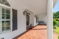 102 Fairway Drive W, Morehead City, NC 28557 — 3-bedroom home in Brandywine Bay, Morehead City, NC, photo 6 of 56: Covered front porch