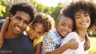 241 Maddox Drive, Aberdeen, NC 28315 — 3-bedroom townhome in Martin Farms, Aberdeen, NC, photo 21 of 25: Young-African-American-Family-Smiling-Pi