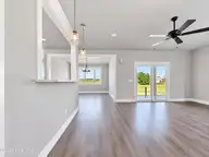 462 Pointe Vista Drive, Elizabeth City, NC 27909 — 3-bedroom waterfront home in The Waters At Sunset Pointe, Elizabeth City, NC, photo 3 of 19: living room