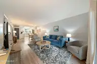 505 N Carolina Beach Avenue Unit 1c, Carolina Beach, NC 28428 — 2-bedroom waterfront condo in Winds at Carolina Beach, Carolina Beach, NC, photo 5 of 44: Living Room 1