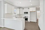 305 Birmingham Avenue 2, Carolina Beach, NC 28428 — 4-bedroom townhome, Carolina Beach, NC, photo 8 of 27: 215SpartanburgAvenueUnit1-9
