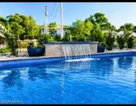7120 Canal Drive, Emerald Isle, NC 28594 — 4-bedroom waterfront home in Archers Point, Emerald Isle, NC, photo 10 of 43: IMG_9289