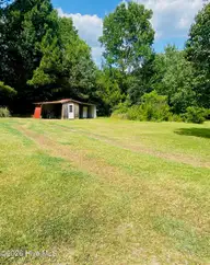 2537 Alton Road, Eagle Springs, NC 27242 — 2-bedroom manufactured home, Eagle Springs, NC, photo 3 of 14: rear property