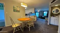 9201 Coast Guard Road E-101, Emerald Isle, NC 28594 — 3-bedroom waterfront condo in Pebble Beach, Emerald Isle, NC, photo 18 of 50: dining