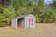 130 Fodder Drive, Hubert, NC 28539 — 3-bedroom home in Ole Mill Village, Hubert, NC, photo 21 of 24: 35_shed