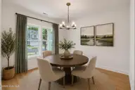 730 Blue Bird Drive, Vass, NC 28394 — 4-bedroom home in Woodlake, Vass, NC, photo 5 of 60: Janville Dining room-virtually staged