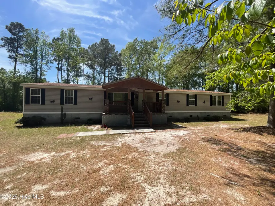 1220 Saint Johns Church Road, Hampstead, NC 28443 — 4-bedroom manufactured home, Hampstead, NC, photo 1 of 23: IMG_3107