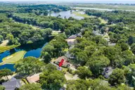 514 Woods Court SW, Sunset Beach, NC 28468 — 3-bedroom home in Sea Trail Plantation, Sunset Beach, NC, photo 7 of 50: 7-web-or-mls-6 overview with arrow