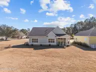 498 Genoes Point Road SW, Supply, NC 28462 — 3-bedroom waterfront home in Lockwood Folly, Supply, NC, photo 3 of 56: Huge Backyard sod and irrigation