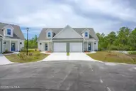 225 Sandpiper Place, Holly Ridge, NC 28445 — 3-bedroom townhome in Coastal Village, Holly Ridge, NC, photo 5 of 30: 225.227 Sandpiper Place - Exterior - MLS