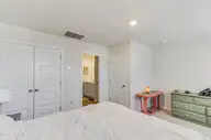 2049 Wild Indigo Circle NW, Calabash, NC 28467 — 3-bedroom townhome in Brunswick Plantation, Calabash, NC, photo 20 of 40: Upper Level Bedroom