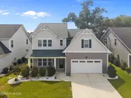 144 Violetear Ridge, Hampstead, NC 28443 — 4-bedroom home in Sparrows Bend, Hampstead, NC, photo 2 of 49: 2-web-or-mls-DJI_20250819114055_0395_D