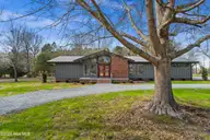 1000 Pine Street, Lake Waccamaw, NC 28450 — 4-bedroom waterfront home, Lake Waccamaw, NC, photo 1 of 60: Front Door