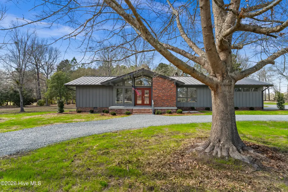 1000 Pine Street, Lake Waccamaw, NC 28450 — 4-bedroom waterfront home, Lake Waccamaw, NC, photo 1 of 60: Front Door