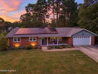22 Pine Lake Drive, Whispering Pines, NC 28327 — 3-bedroom waterfront home in Pine Lakes, Whispering Pines, NC, photo 2 of 53: Twilight Magic