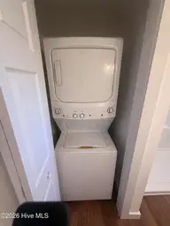 108 NW 29th Street, Oak Island, NC 28465 — 3-bedroom home in Pinners Point, Oak Island, NC, photo 5 of 16: Laundry