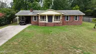2010 Westwood Drive, Kinston, NC 28504 — 3-bedroom home, Kinston, NC, photo 2 of 25: dji_fly_20260821_133352_0001_17873440550