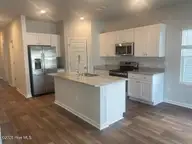 2209 Osprey Isle Lane SW Lot 164 Berkeley, Ocean Isle Beach, NC 28469 — 4-bedroom townhome in Osprey Isle, Ocean Isle Beach, NC, photo 8 of 17: 8 kitchen