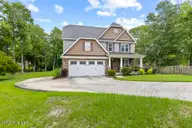 201 Old Millstone Court, Sneads Ferry, NC 28460 — 4-bedroom waterfront home in Old Millstone Landing, Sneads Ferry, NC, photo 1 of 43