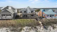 5127 W Beach Drive, Oak Island, NC 28465 — 5-bedroom waterfront home, Oak Island, NC, photo 4 of 73: 63_drone