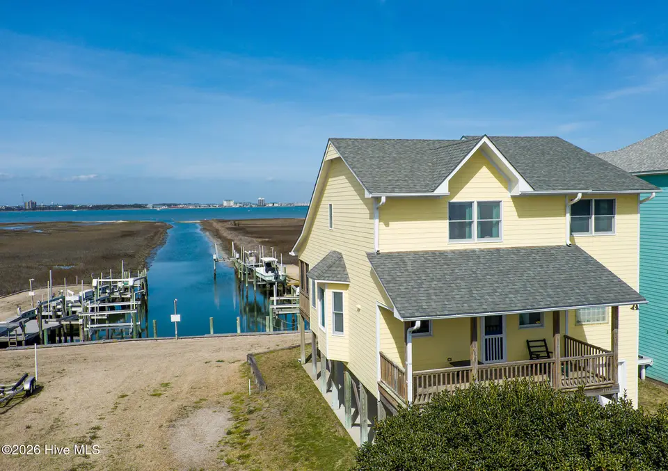 1711 E Fort Macon Road, Atlantic Beach, NC 28512 — 4-bedroom waterfront home in Asbury Beach, Atlantic Beach, NC, photo 1 of 42: On Canal