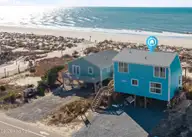 2925 E Beach Drive, Oak Island, NC 28465 — 4-bedroom waterfront home, Oak Island, NC, photo 1 of 58