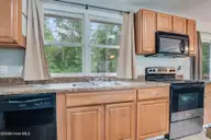 819 Barn Street, Jacksonville, NC 28540 — 3-bedroom home in Northwoods, Jacksonville, NC, photo 12 of 47