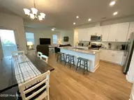 1425 Eco Circle, Wilmington, NC 28409 — 3-bedroom home in Deer Crossing, Wilmington, NC, photo 16 of 31: Open concept