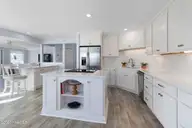 301 Salter Path Road 12 Genesis, Pine Knoll Shores, NC 28512 — 3-bedroom waterfront condo in Genesis, Pine Knoll Shores, NC, photo 4 of 48: Spacious Kitchen with Center Island
