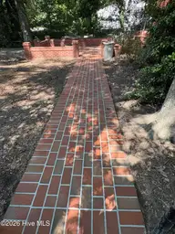 802 Forest Hill Circle, Greenville, NC 27858 — 3-bedroom home in University, Greenville, NC, photo 4 of 31: Walkway to side door