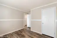 6745 Lewis Drive SE, Winnabow, NC 28479 — 3-bedroom manufactured home in Lewis Acres, Winnabow, NC, photo 22 of 28: Guest bedroom