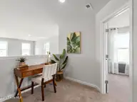4242 Allsbrook Lane Unit 1010, Leland, NC 28451 — 3-bedroom townhome in Indigo Preserve, Leland, NC, photo 22 of 43: Loft area at top of Stairs