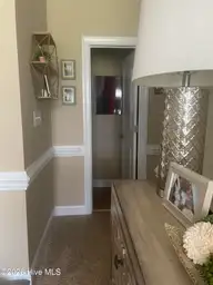 6725 Hemlock Court, Sims, NC 27880 — 4-bedroom home in Magnolia Place, Sims, NC, photo 14 of 58: hallway to master bedroom