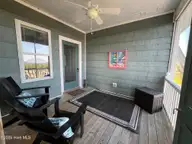 112 Oakleaf Drive 1003-A, Pine Knoll Shores, NC 28512 — 2-bedroom waterfront condo in Shutters OS, Pine Knoll Shores, NC, photo 12 of 58: Front balcony (c)