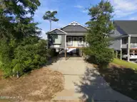 317 NE 60th Street, Oak Island, NC 28465 — 3-bedroom home in Tranquil Harbor, Oak Island, NC, photo 2 of 54: 2-web-or-mls-DJI_20261001091144_0598_D