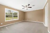 165 Godfrey Boulevard, Havelock, NC 28532 — 3-bedroom waterfront home in Godfreys Creek Estates, Havelock, NC, photo 17 of 52: Primary suite