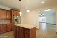 39 Forest Lake Drive, Jackson Springs, NC 27281 — 4-bedroom home in Foxfire Village East, Jackson Springs, NC, photo 21 of 49: 21 Kitchen looking into Living Room and