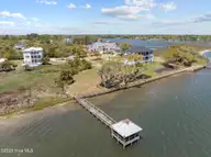 Lot 21r Shipyard Lane, Hampstead, NC 28443 — waterfront lot in Sloop Point Plantation, Hampstead, NC, photo 3 of 36: 14-web-or-mls-DJI_20250409112004_0115_D