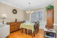 3578 Spring Mill Trail Road, Rocky Mount, NC 27804 — 3-bedroom home in Old Carriage Farm, Rocky Mount, NC, photo 5 of 35: Dinning room with hardwood floors