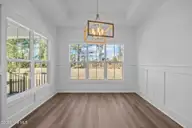 498 Genoes Point Road SW, Supply, NC 28462 — 3-bedroom waterfront home in Lockwood Folly, Supply, NC, photo 12 of 56: Dining room