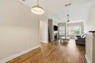 1924 Tara Court 202, Greenville, NC 27858 — 2-bedroom condo in Tara, Greenville, NC, photo 19 of 39: Breakfast room to living room