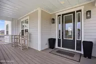 2765 Alvernia Drive, Castle Hayne, NC 28429 — 4-bedroom waterfront home in Sunset Reach, Castle Hayne, NC, photo 4 of 52: 3_2765_alvernia_dr_003