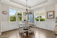 3014 Pine Bloom Way, Leland, NC 28451 — 4-bedroom home in Brunswick Forest, Leland, NC, photo 21 of 69: Dining room with wainscoting