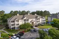 260 Woodlands Way Unit 2, Calabash, NC 28467 — 3-bedroom condo in Crow Creek, Calabash, NC, photo 2 of 48: 260 Woodlands drone update-2