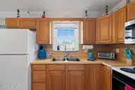 5221 E Pelican Drive, Oak Island, NC 28465 — 2-bedroom waterfront home, Oak Island, NC, photo 15 of 52