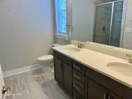 1558 Harbour Place Drive, Calabash, NC 28467 — 2-bedroom home in Kingfish Bay, Calabash, NC, photo 15 of 42: mbr bath1
