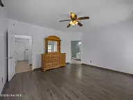 200 E Howard Drive, Jacksonville, NC 28540 — 4-bedroom home in River Bluff, Jacksonville, NC, photo 21 of 55: Primary suite 2