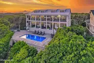 585 Forest Dunes Drive, Pine Knoll Shores, NC 28512 — 4-bedroom waterfront home in Beacon's Reach, Pine Knoll Shores, NC, photo 2 of 68: Oceanfront home in Beacon's Reach