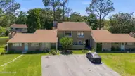 165 Quarterdeck, New Bern, NC 28562 — 2-bedroom waterfront townhome in River Bend, New Bern, NC, photo 3 of 49: 1-web-or-mls-DJI_20260515145627_0797_D