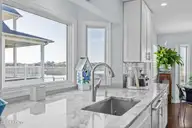 103 E Island Drive, Oak Island, NC 28465 — 3-bedroom waterfront home, Oak Island, NC, photo 15 of 76: 38_kitchen